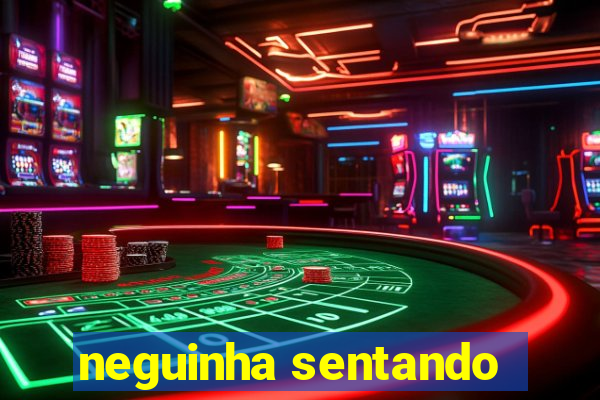 neguinha sentando